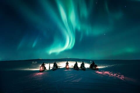 Northern Lights Snowmobile Safari from Rovaniemi with Campfire Picnic