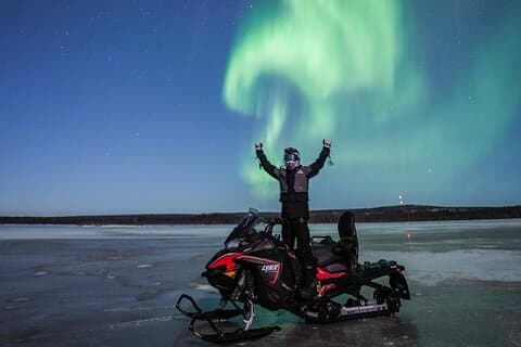 Snowmobile Night Tour Rovaniemi in small group