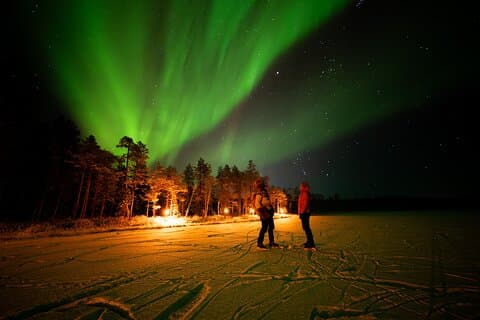 Northern Lights and starry sky in winter