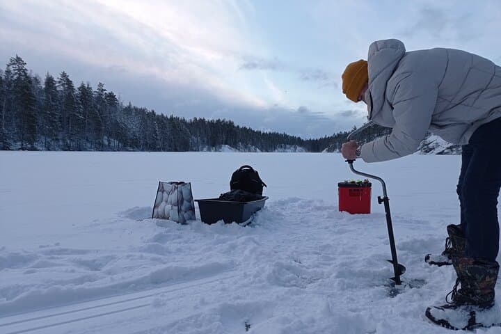 Ice fishing experience with Backpacker Helsinki Tour
