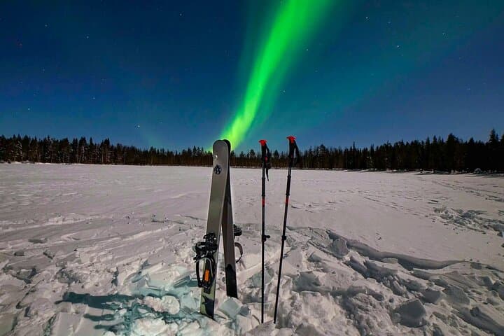 Ski trekking under the Northern Lights