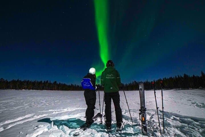 Ski trekking under the Northern Lights
