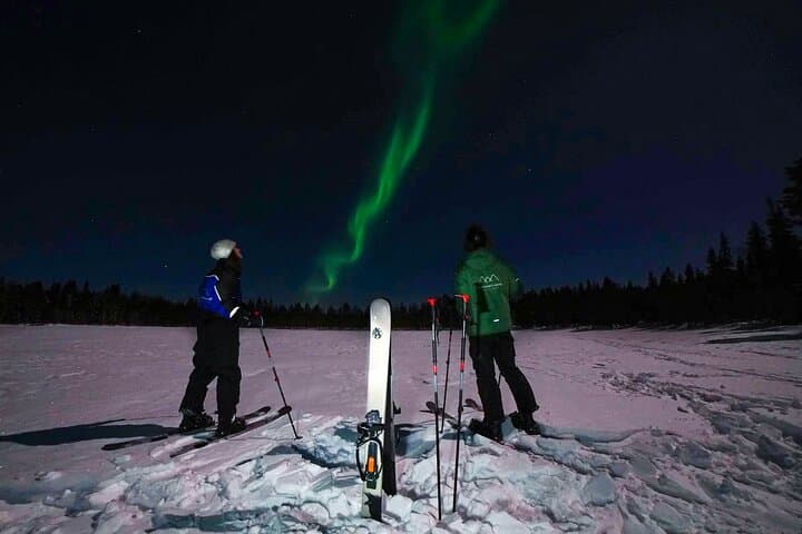 Ski trekking under the Northern Lights