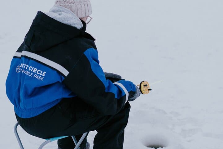 Ice Fishing by Snowmobile in Levi