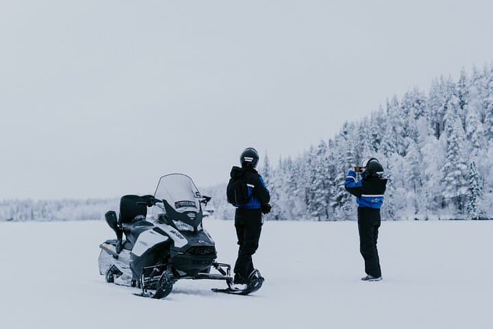 Ice Fishing by Snowmobile in Levi