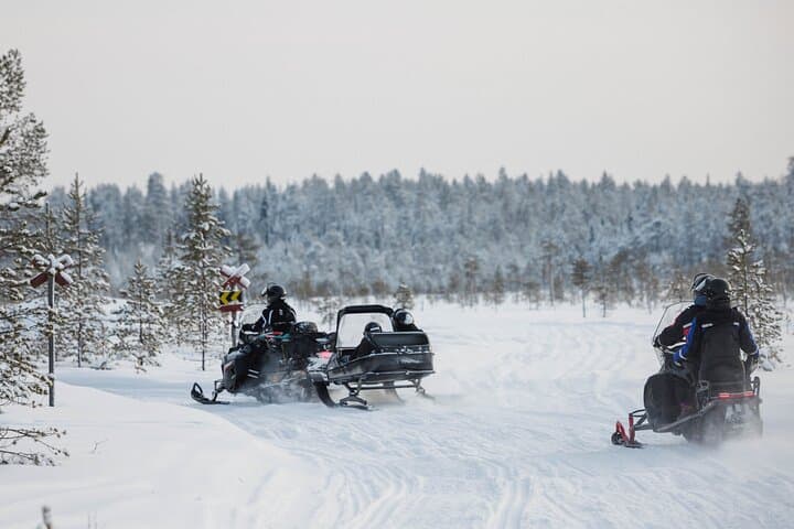 Two hours Snowmobile Safari Driving into Lappish Forests