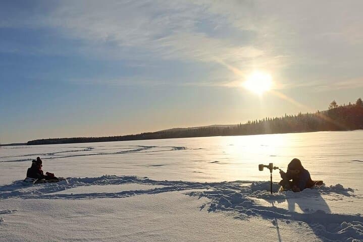 Lapland Winter Adventure Snowmobiling and Ice Fishing Experience