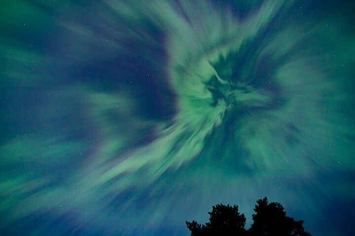 Aurora Borealis lighting up the night sky in Ylläs