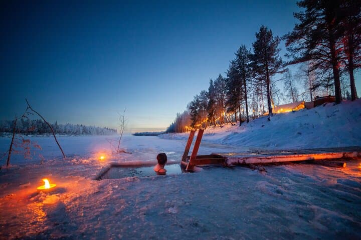 Private Snowmobile Safari with Riverside Sauna