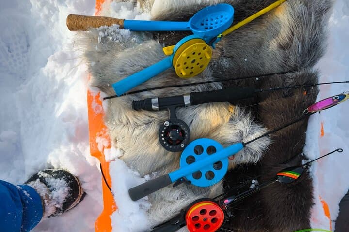 Authentic Ice Fishing by Sledge in Lapland