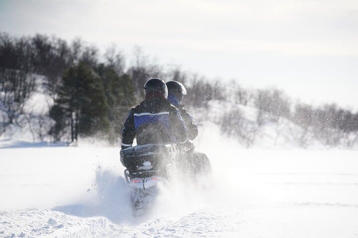 Mini Snowmobile Expedition in Wild Lapland