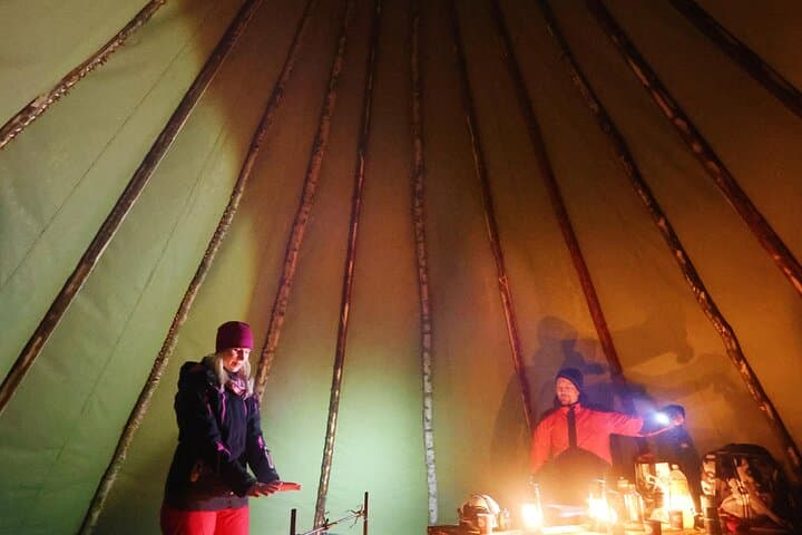 Evening Ice Fishing at Niesikivalo Arctic Night Experience 4h