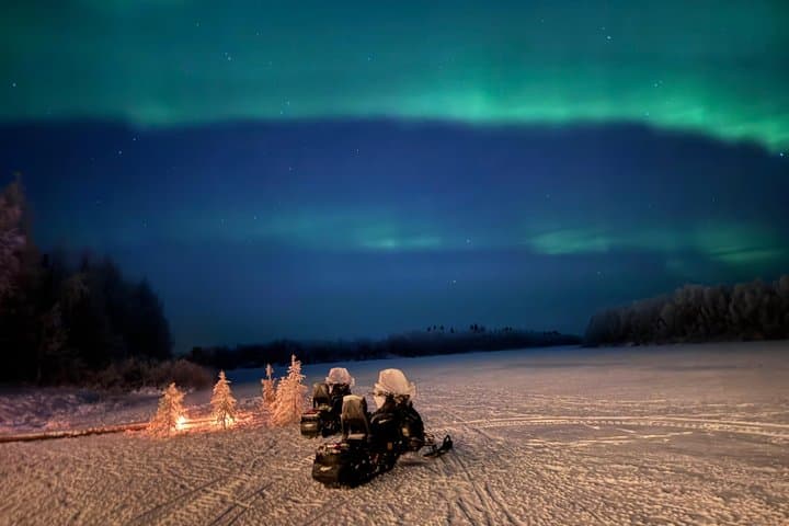 Private Evening Snowmobile Safari with Aurora Spotting