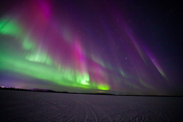 Private Evening Snowmobile Safari with Aurora Spotting