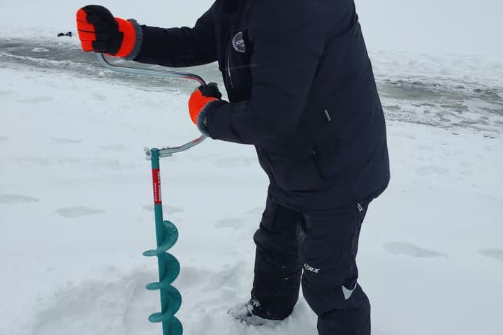 Discover Arctic Ice Fishing in Rovaniemi