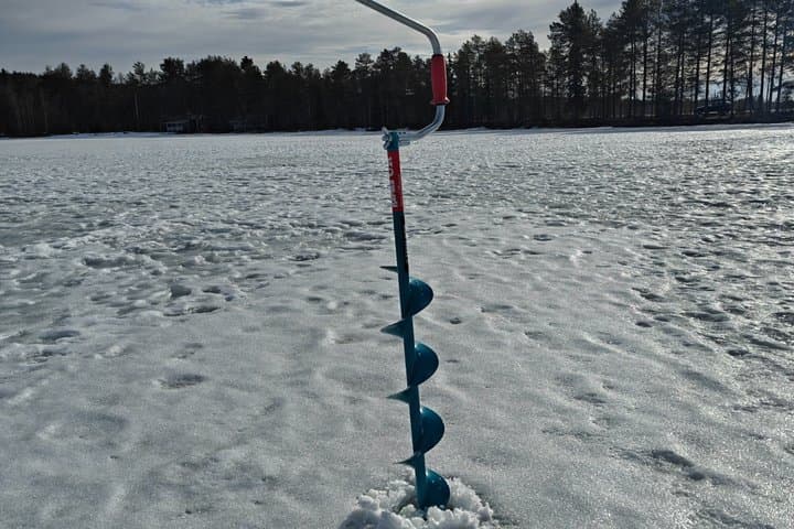 Discover Arctic Ice Fishing in Rovaniemi