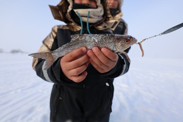 Snowmobile and Ice Fishing Experience