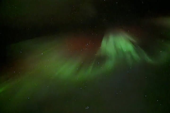 Aurora Borealis on Lake Inari Snowmobile Night Tour
