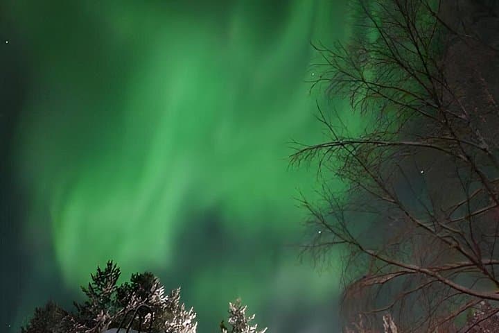 Aurora Borealis on Lake Inari Snowmobile Night Tour