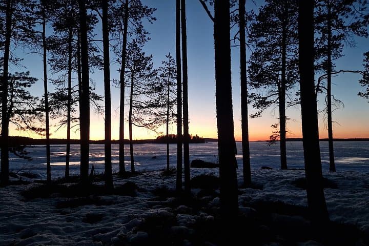Aurora Borealis on Lake Inari Snowmobile Night Tour