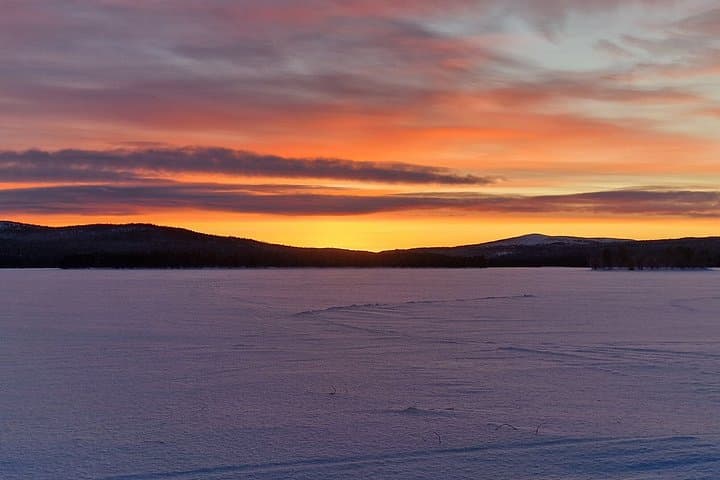 Aurora Borealis on Lake Inari Snowmobile Night Tour