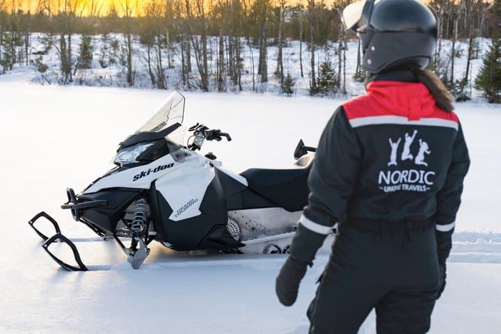 Snowmobile Safari through Lappish Forest from Rovaniemi