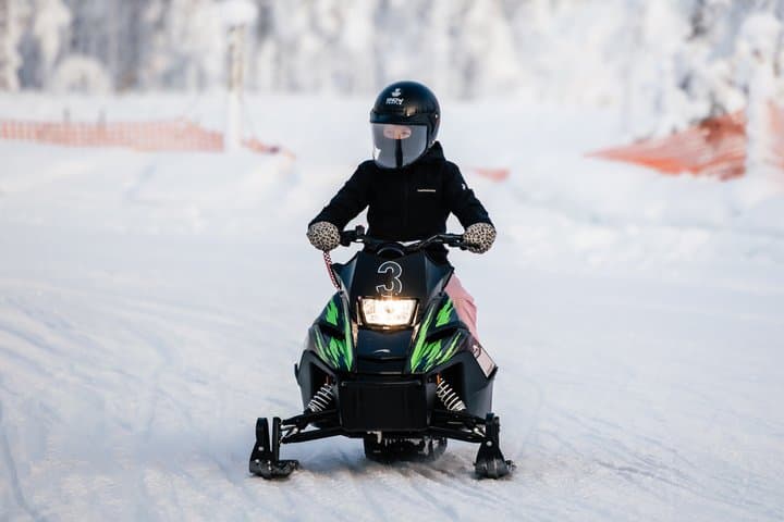 Lapland Winter Park Mini snowmobile fun for kids in Rovaniemi