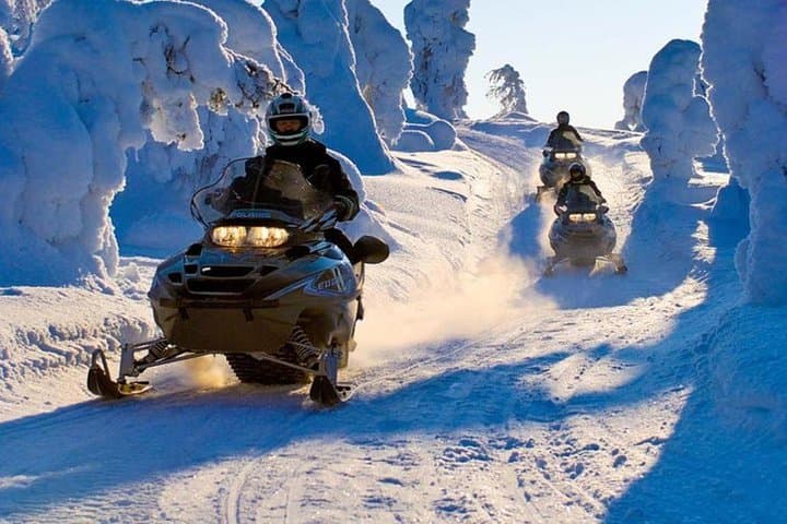Ice Fishing by Snowmobile from Levi, Finland
