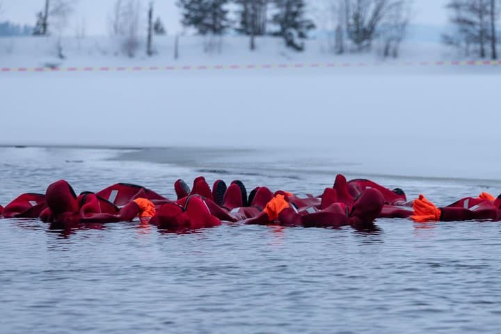 Dry-suit floating in Lake Saimaa