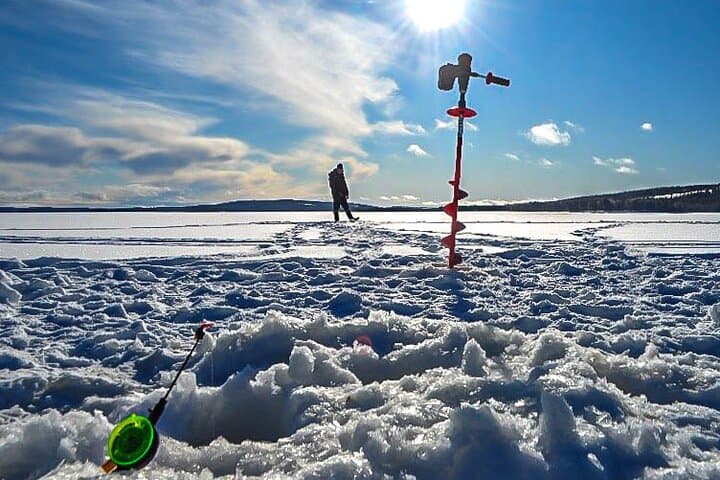 Traditional Ice fishing experience in Lapland