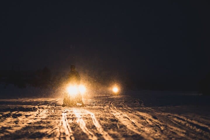 Driving over the lake through the dark