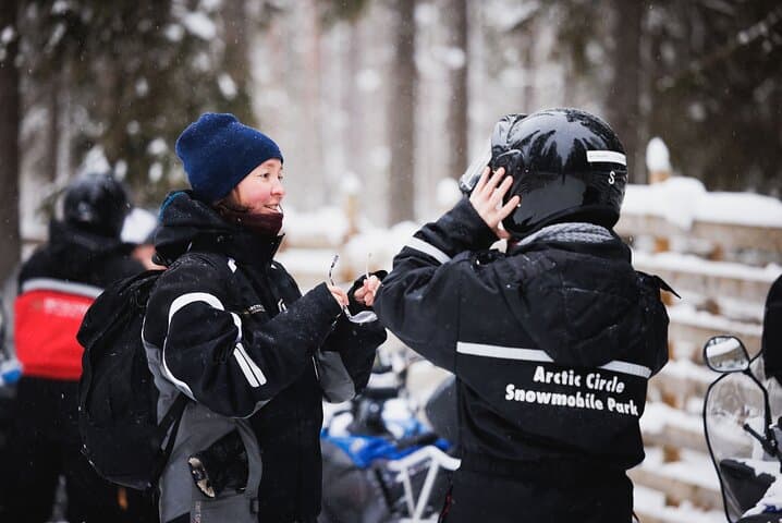 Husky and Reindeer Experience With Snowmobiling