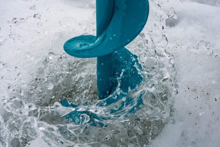 Ice Fishing in a small group with snowshoeing and salmon soup