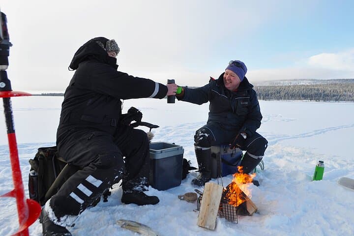 Traditional Ice fishing experience in Lapland