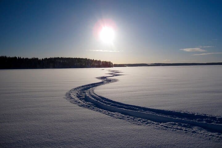 Riding across frozen rivers and lakes.