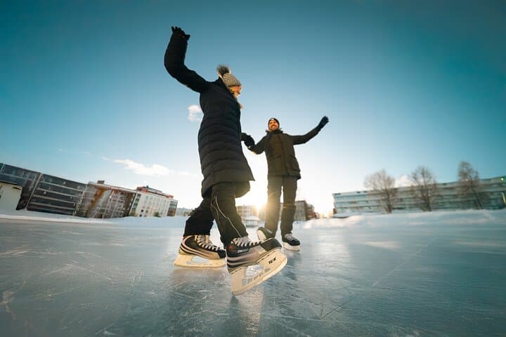 Ice skating private couple photography session Rovaniemi