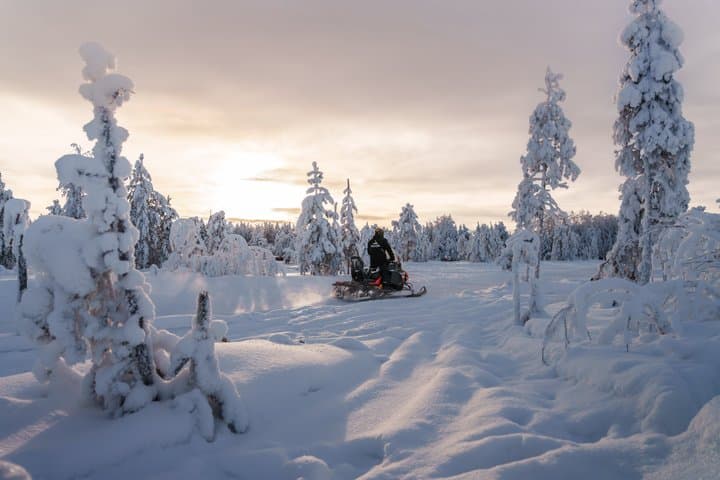 Snowmobile Tours in Rovaniemi Lapland in small group