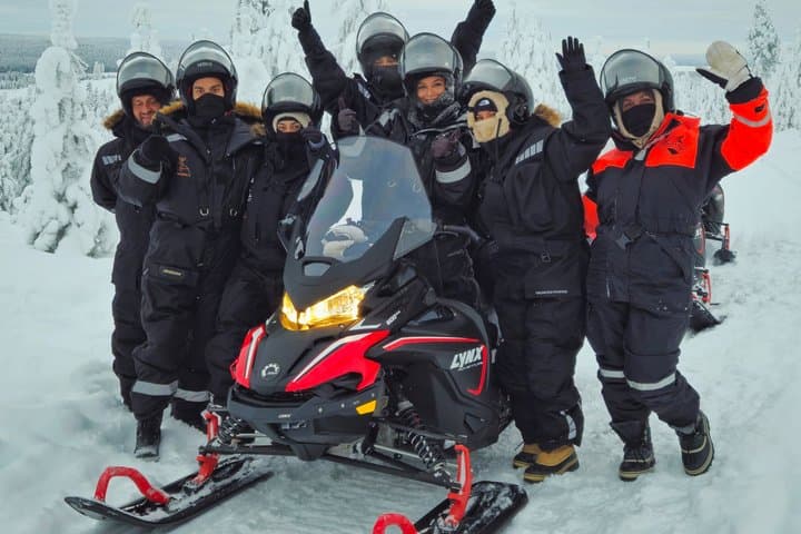 Private Snowmobile and Lappish Meal by the Fire
