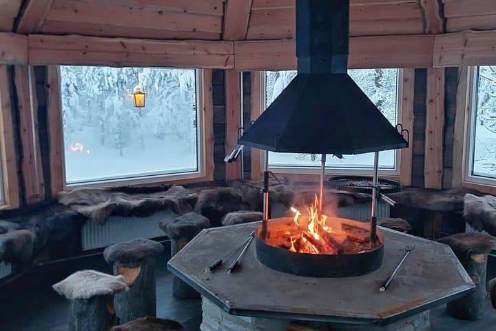 Private Snowmobile and Lappish Meal by the Fire